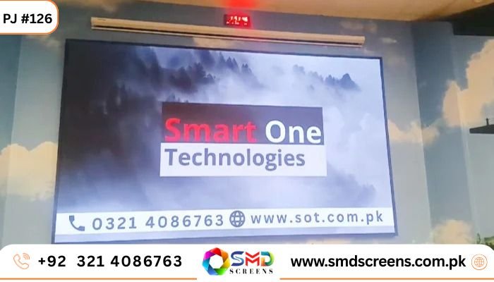 Wide indoor LED video wall installed on a conference room wall, showing the 'Smart One Technologies' logo.
